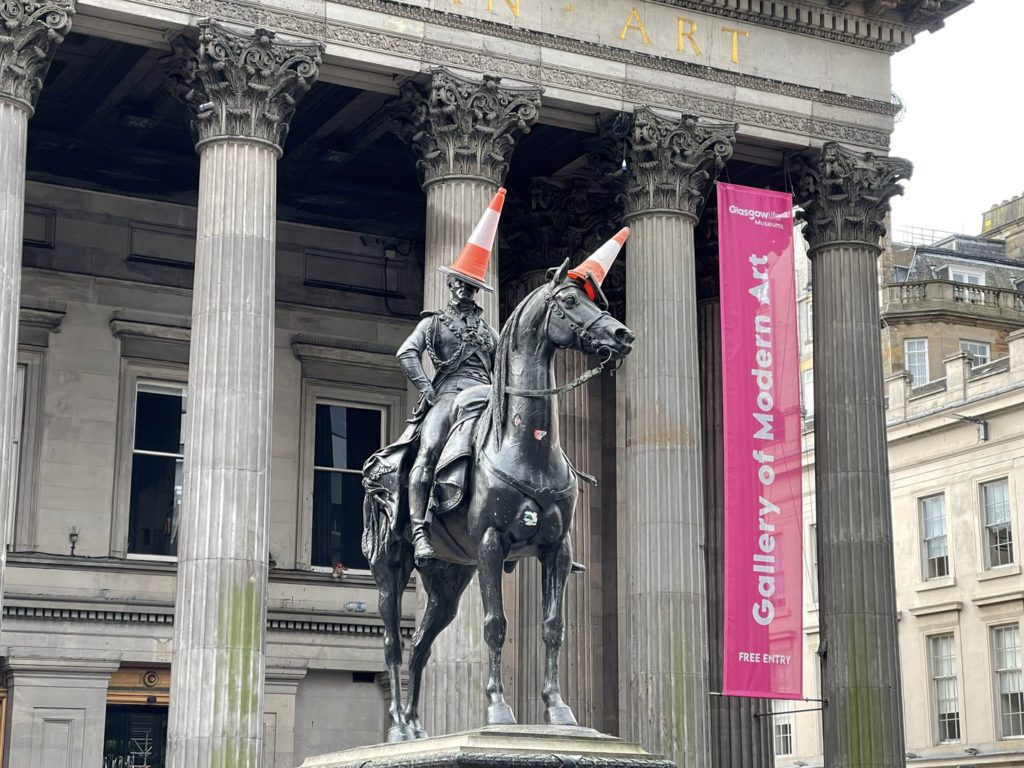 Glasgow Statue with Traffic Cone